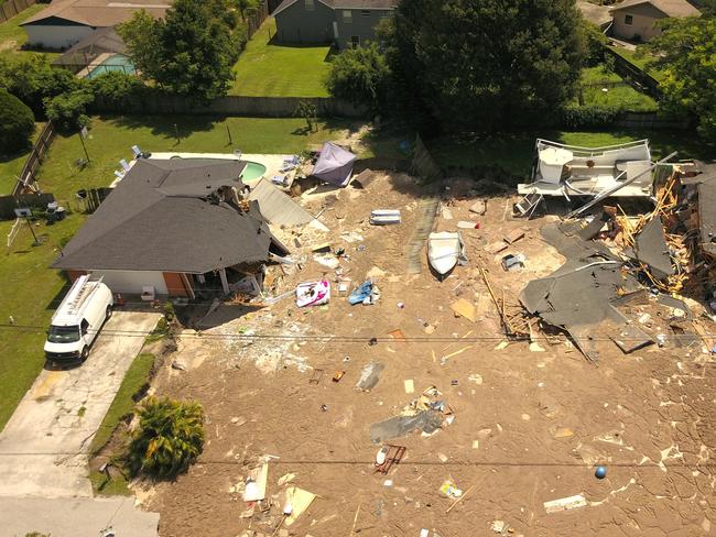 Sinkhole in Pasco County, Florida takes two homes, boat, locals ...