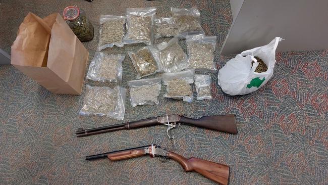 Firearms and marijuana allegedly located. Picture: QPS