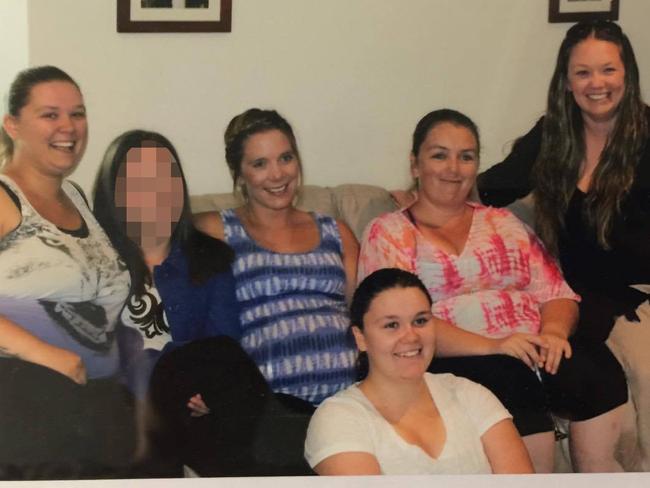 Ms Costigan with her friends and family members at her baby shower, a month before she was killed.