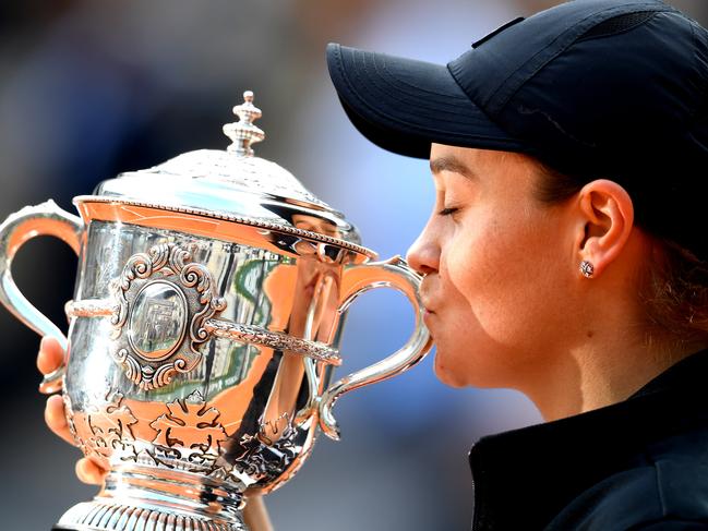 *2019 Top 20 Australia Pictures of The Year* - PARIS, FRANCE - JUNE 08: Ashleigh Barty of Australia kisses the trophy as she celebrates victory following the ladies singles final against Marketa Vondrousova of The Czech Republic during Day fourteen of the 2019 French Open at Roland Garros on June 08, 2019 in Paris, France. (Photo by Clive Mason/Getty Images)