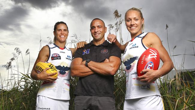 Crows co-captains Chelsea Randall and Erin Phillips wearing their indigenous jumper during a past season, which was designed by McLeod. Picture: Sarah Reed