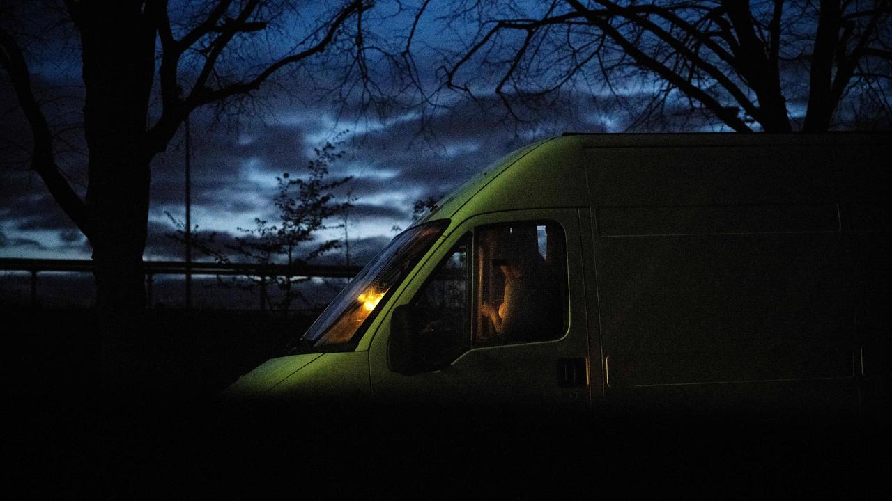 A sex worker waits for a client in her van in the Bois de Vincennes, eastern Paris. Picture: Julien de Rosa/AFP