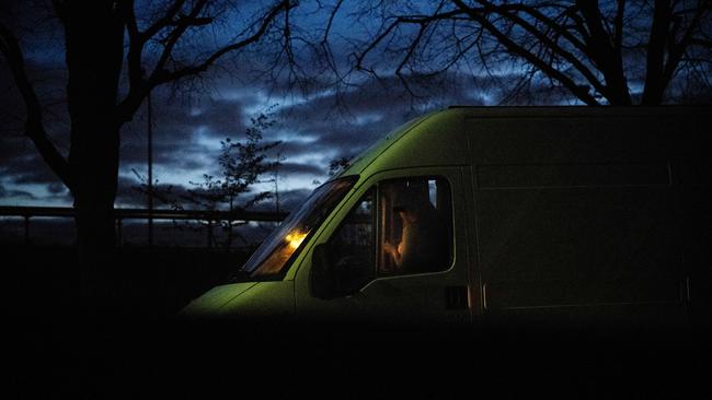 A sex worker waits for a client in her van in the Bois de Vincennes, eastern Paris. Picture: Julien de Rosa/AFP