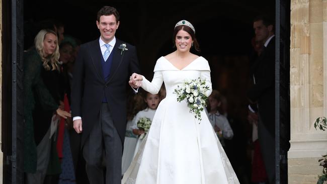 Princess Eugenie of York and her husband Jack Brooksbank on the steps of St George's Chapel. Picture: Getty