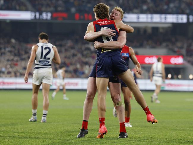 Clayton Oliver and Caleb Windsor celebrate a final quarter goal. Picture: Michael Klein