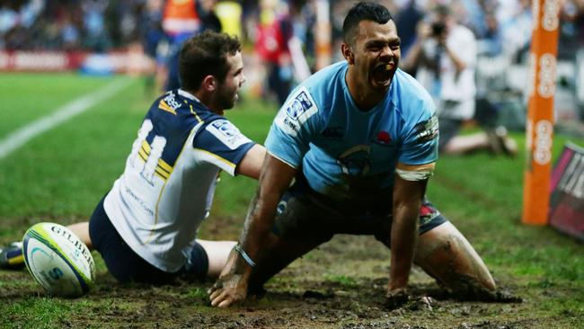Kurtley Beale celebrates scoring a try for the Waratahs in the semi-final win over the Brumbies.