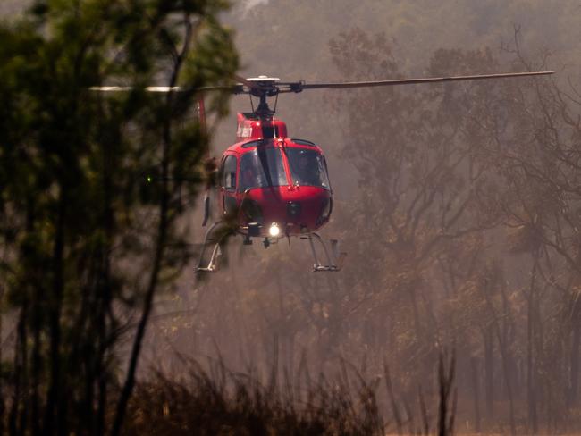 Another day of extreme fire conditions sees numerous fires across Darwin's rural regions. A Gunn Point Road was quickly brought under control by numerous appliances working in windy conditions.Picture: Che Chorley