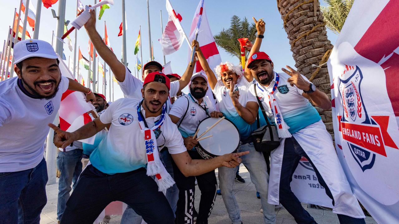 ‘We’re not fake’: England’s curious fans in Qatar