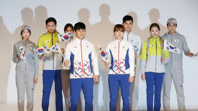 South Korean athletes model long-sleeved training gear impregnated with mosquito repellent to protect them from the Zika virus during the Rio Olympics. Picture: AFP