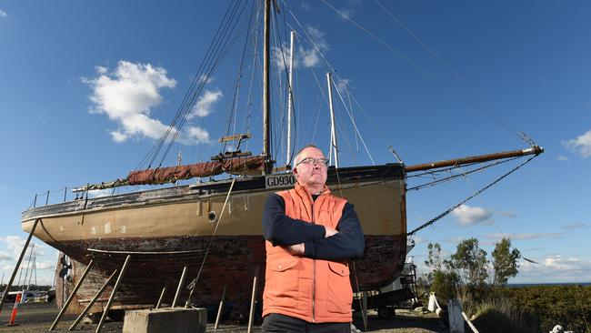 Yaringa Harbour owner Stefan Borzecki with the Zephyr, which he says should be restored and placed in a museum. Picture: David Smith