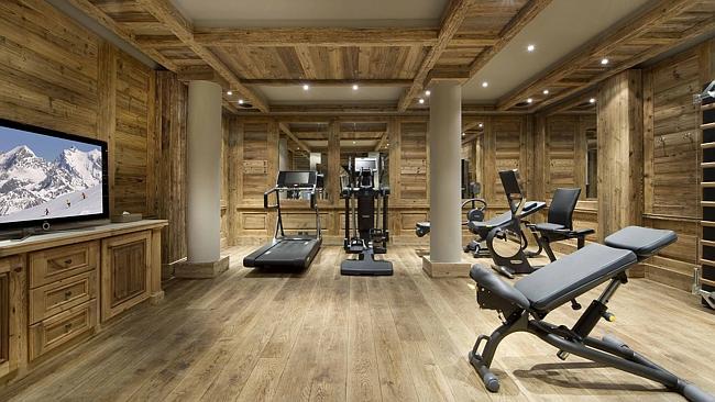 There is a large fitness room and therapy rooms on the same level as the pool.