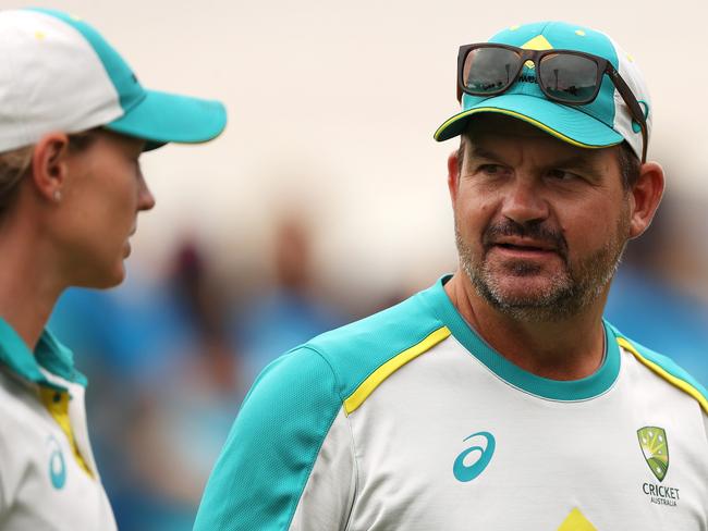 CANBERRA, AUSTRALIA - JANUARY 30: Australian captain Meg Lanning and Australian coach Matthew Mott speaks before play o day four of the Women's Test match in the Ashes series between Australia and England at Manuka Oval on January 30, 2022 in Canberra, Australia. (Photo by Mark Kolbe/Getty Images)