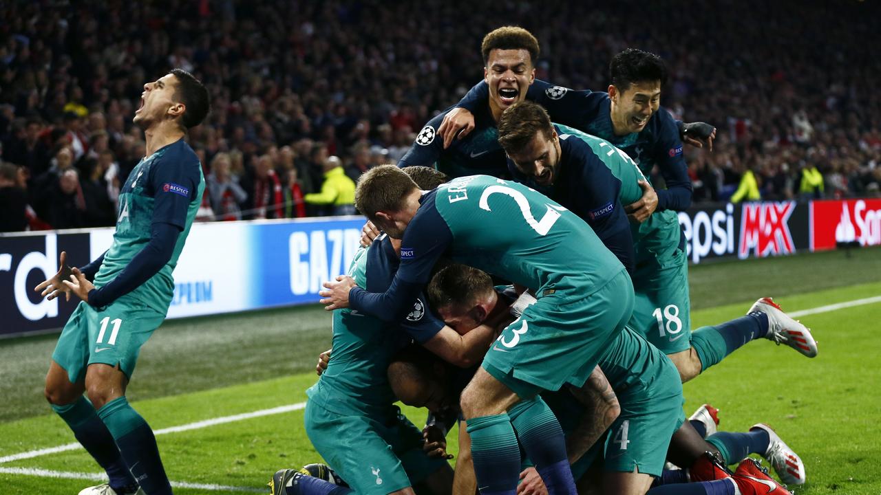 Tottenham players celebrate pulling off an incredible comeback against Ajax.