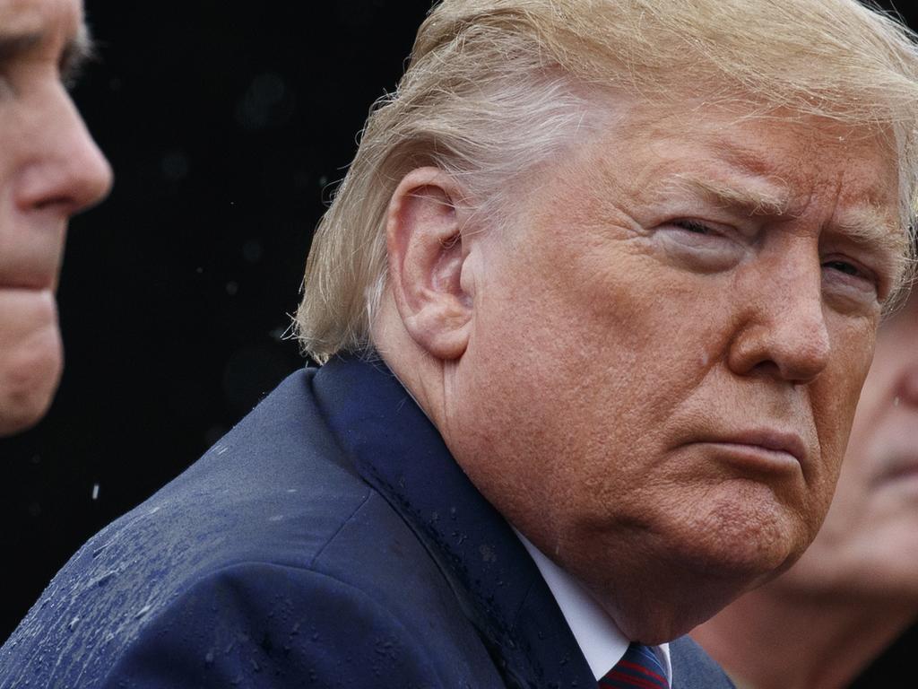 Always at the centre of a scandal, President Donald Trump is currently playing down his connection to two businessmen accused of illegally funnelling foreign money into American politics. Picture: AP/Evan Vucci.