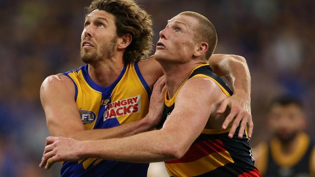 Sam Jacobs (right) in AFL action for the Crows against West Coast in 2019. Picture: Paul Kane/Getty Images