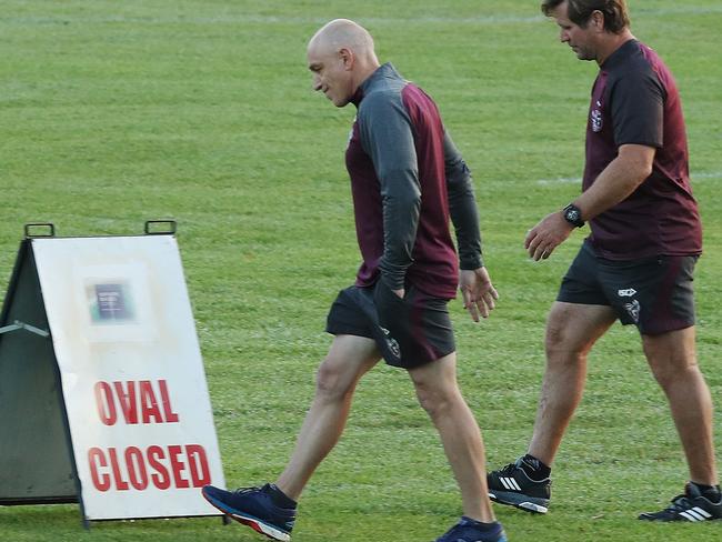 Cronulla Sharks NRL official Shane Smith inspects Brookvale Oval with Manly officials including coach Des Hasler and Manly GM of football John Bonasera, after concerns regarding the playing surface. Picture: Brett Costello