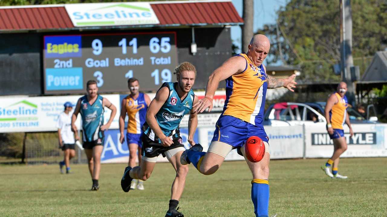 POWER BALL: Klint Wagstaff gets some distance for The Waves in the AFL Grand Final at Brothers Sports complex in Bundaberg. Picture: Paul Donaldson BUN030916AFL5