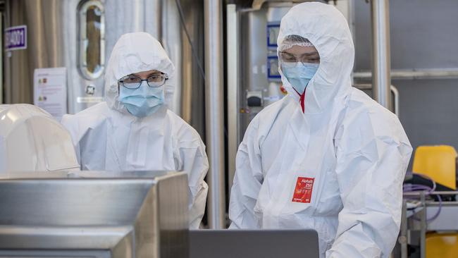 Staff at the Melbourne lab of CSL, which has begun manufacturing the AstraZeneca-Oxford University COVID-19 vaccine. Picture: Getty Images