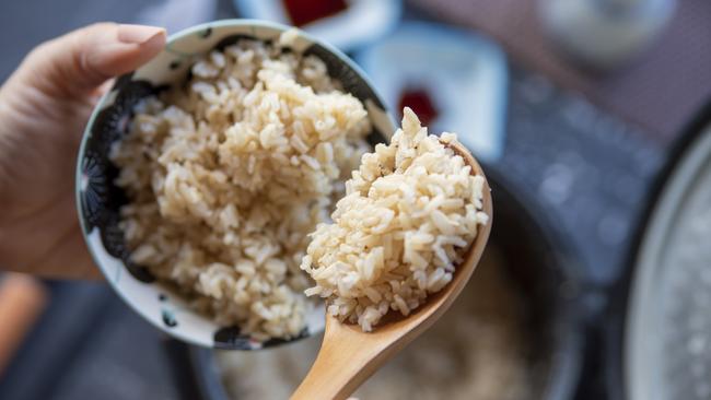White rice is less nutritious than brown rice but that doesn’t mean it’s ‘empty calories’. Picture: Getty Images
