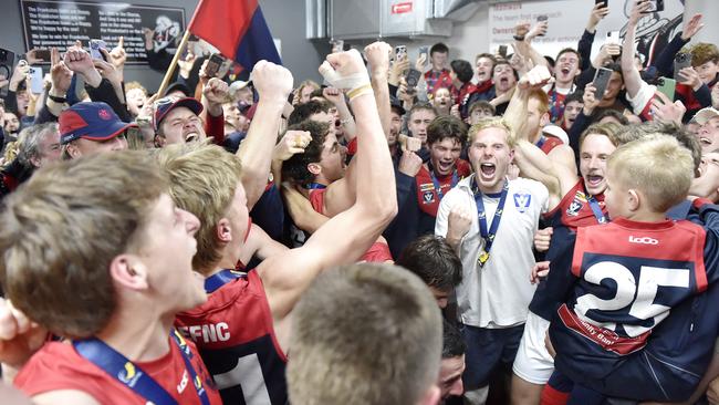 Mt Eliza celebrate in the rooms after their win. Picture: Andrew Batsch