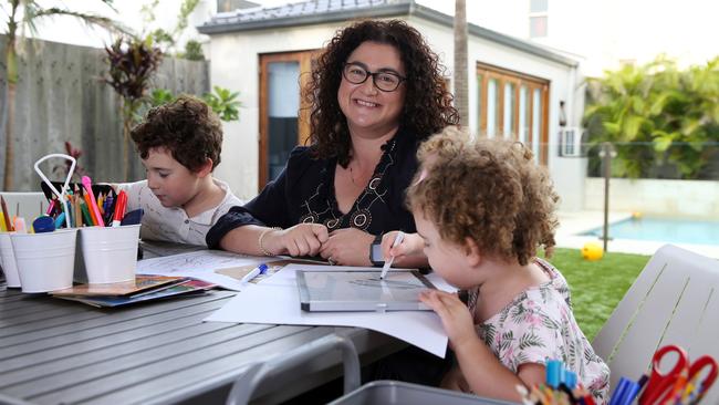 24/03/2020. Teacher and mum Tracy Caganoff Fischl with her children (L-R) Toby (5) and Libby (3) started a Facebook group for sharing learning resources 10 days ago which has now got over 11k followers and climbing. Jane Dempster/The Australian.