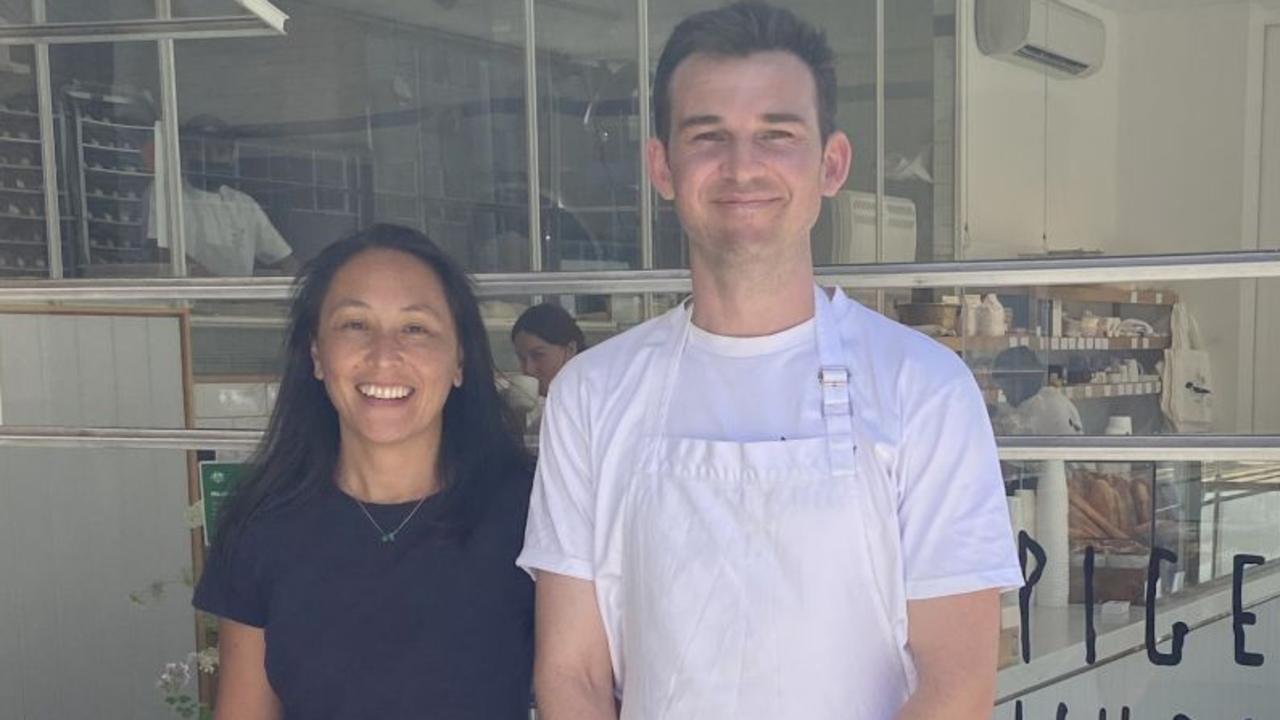 Dean Nye with the general manager of Whole Pigeon Bakers where he landed his job. Picture: Leon Thompson