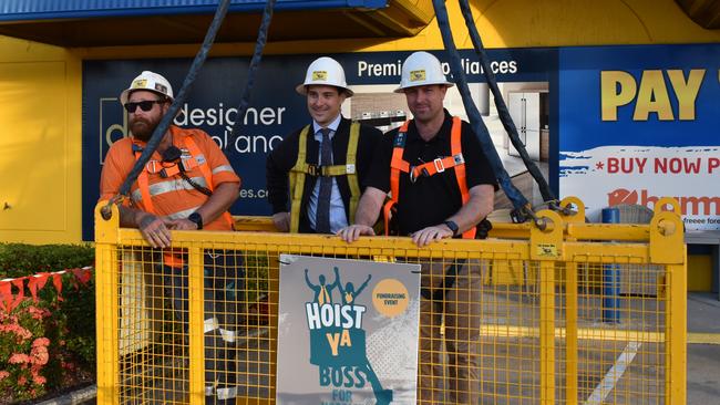 Robert Rooney and Todd Brandon before the crane bucket was lifted 20 metres in the air.