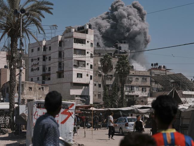 Smoke rises in the sky following an Israeli air strike in Gaza City. Picture: Jehad Alshrafi / AP Photo