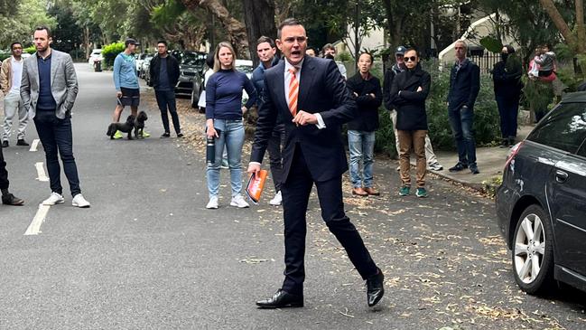 Auctioneer Damien Cooley at an auction in Alexandria recently.