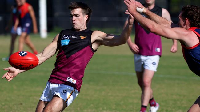 Old Haileybury’s Joshua Gasparini snaps against Old Brighton. Picture: Hamish Blair