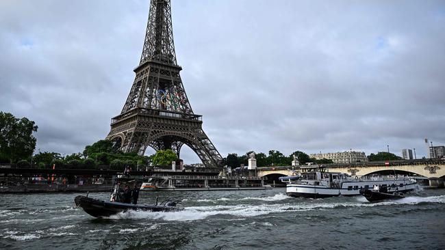 The Seine river was too dirty when to allow the Olympic triathlon and open water swimming competitions, according to tests. Picture: JULIEN DE ROSA / AFP