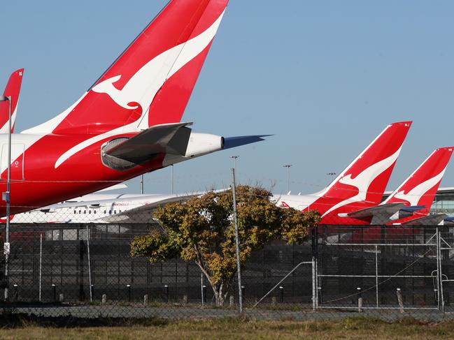 Qantas planes at Brisbane Airport. Picture: NCA NewsWire / Jono Searle.