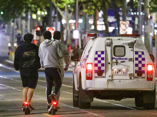 People riding scooters in MelbourneÃ¢â¬â¢s CBD without wearing helmets. Hospitals are reporting high levels of scooter injuries. Picture: Ian Currie