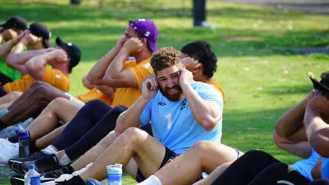 Melbourne Storm players work hard during their infamous pre-season 'I Don't Quit' (IDQ) commando camp. Picture: Darcy Parkinson