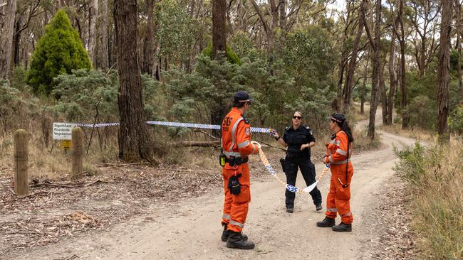 Victoria Police members cordon off a crime scene at Woowookarung Regional Park in Ballarat. Picture: Diego Fedele