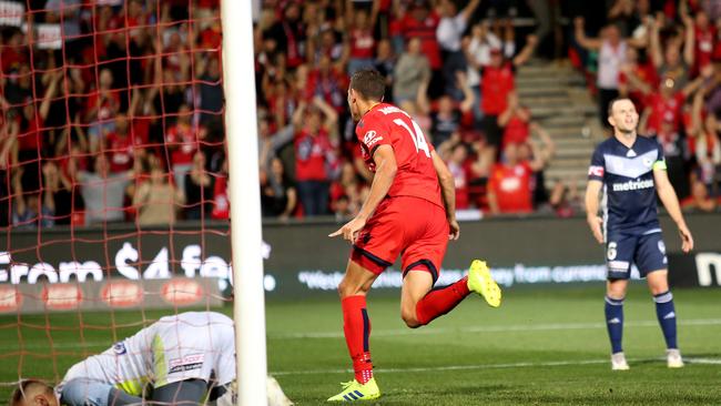 George Blackwood of Adelaide United celebrates his goal during the Reds 1-0 win over Melbourne Victory at Coopers Stadium. (AAP Image/David James Elsby)