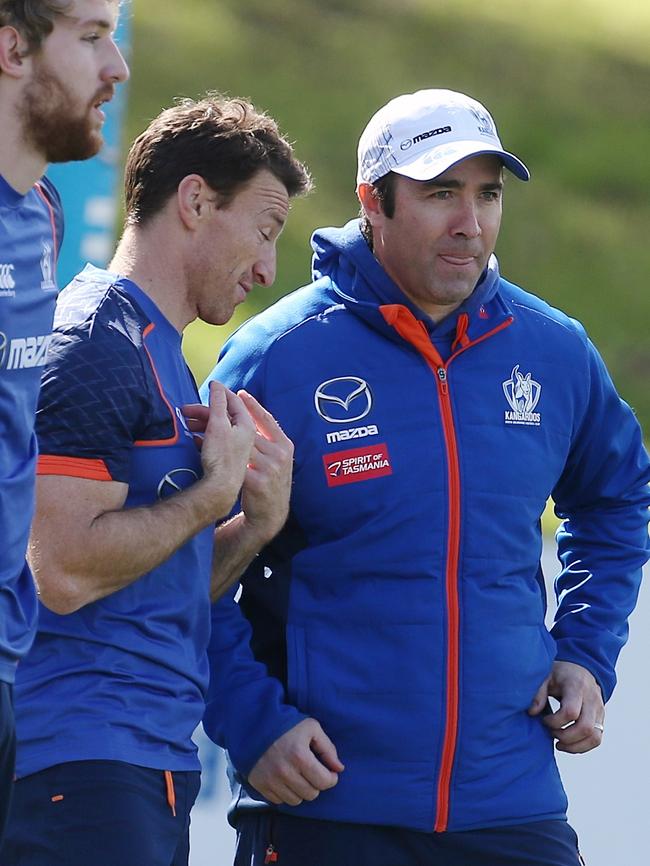 Brent Harvey and Brad Scott at training on Wednesday. Picture: Wayne Ludbey