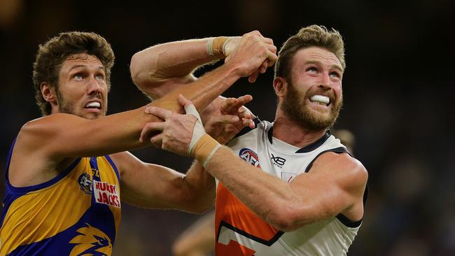 Dawson Simpson jostles with Tom Hickey during GWS Giants’ loss to West Coast. Picture: Will Russell/AFL Photos/Getty Images. 