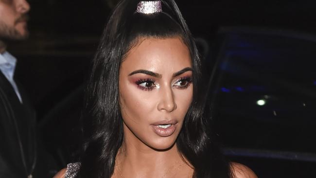 MUST CREDIT GETTYWEB RIGHTS ONLY, ONE TIME USE - FEE APPLIES NEW YORK, NY - DECEMBER 02:  Kim Kardashian is seen wearing a Versace dress outside the Versace Pre-Fall 2019 Collection on December 1, 2018 in New York City.  (Photo by Daniel Zuchnik/Getty Images)