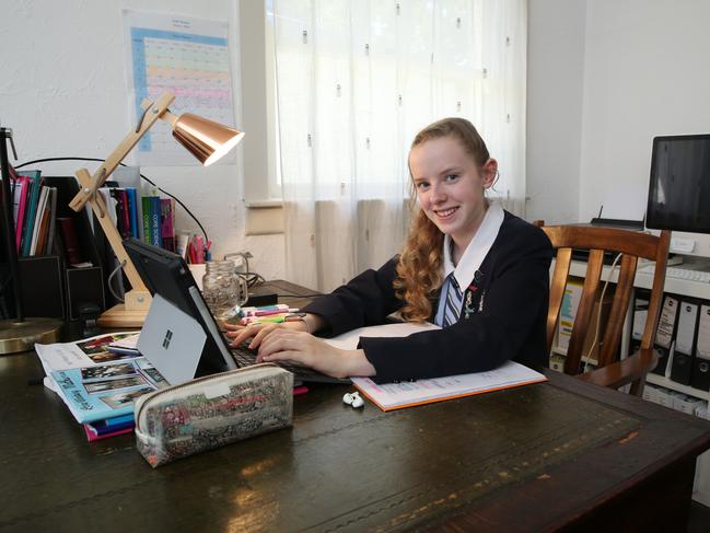 13/03/2020. St Andrews Cathedral School in inner-city Sydney has sent all year 9 students home today as a coronavirus practice run. They are learning remotely. Lara Winsbury is one of those students at home today with her mum Sally Johnstone in Caringbah in Sydney's South. Britta Campion / The Australian