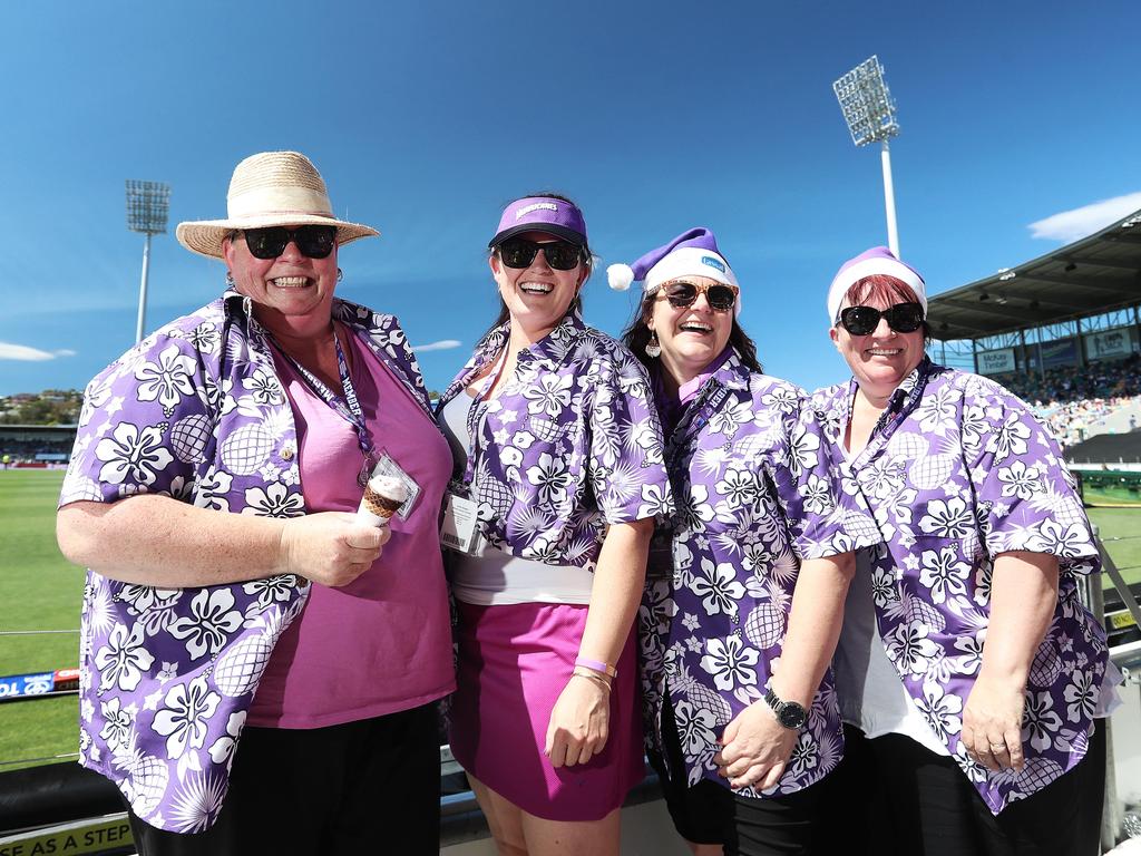 Fans enjoying the hot weather at the Hurricanes match against the Melbourne Stars on Christmas Eve. Picture: LUKE BOWDEN