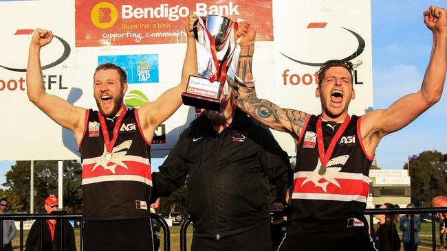 Jarrod Bayliss (right) celebrates the Eastern Football League Division 3 premiership in 2017. Picture: Davis Harrigan