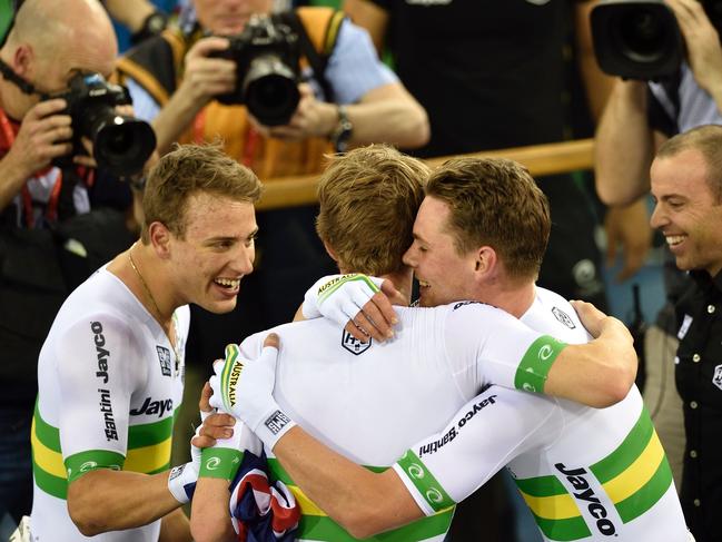 Team Australia celebrate winning gold in the Men's Team Pursuit final during the 2016 Track Cycling World Championships at the Lee Valley VeloPark in London on March 3, 2016 / AFP / Eric FEFERBERG