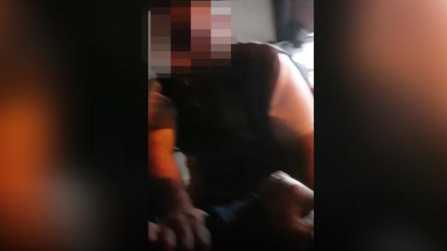 A still from a video of an alleged scuffle between an Uber driver and business owner in North Hobart.