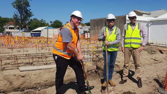 SOD TURN: Rockhampton MP Barry O'Rourke, Paynters Project Manager Craig Hornagold and Paynters CQ manager Wayne Lauga turn the sod on their new $3.3 million social housing project at 102 Campbell Street in Rockhampton's inner-city area.