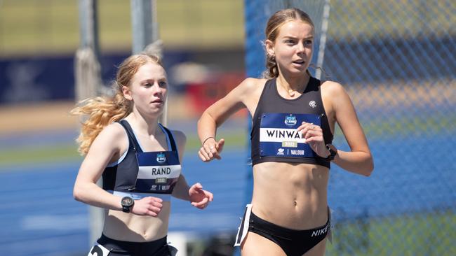 Ada Rand setting her meet record in the girls 17 years 1500m. Pic: Julian Andrews.