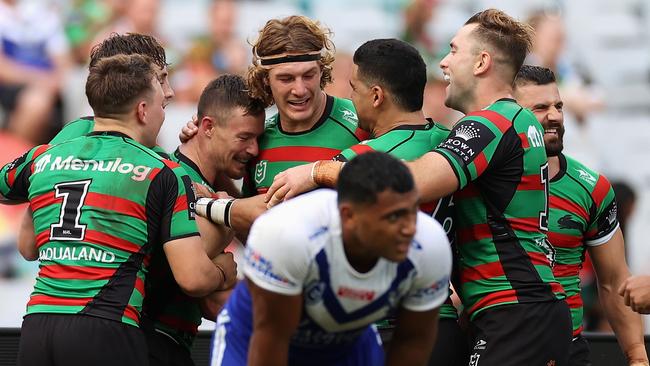 The Rabbitohs celebrate Damien Cook’s try against the Bulldogs. Picture: Cameron Spencer/Getty Images