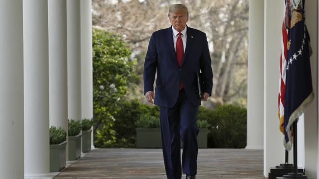 US President Donald Trump walks down the Colonnade from the Oval Office. Picture: Stefani Reynolds/CNP/Bloomberg via Getty Images