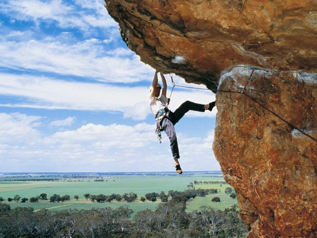 (Pic; Must credit Tourism Victoria)Man abseiling down Mount Arapiles at Horsham  12 Jul 2006. rock climbing mt/Victoria