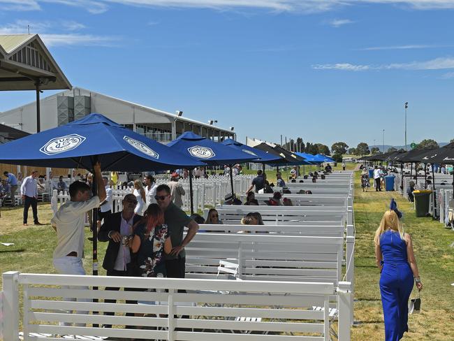 Groups were separated on the lawns at Morphettville Racecourse. Picture: Tom Huntley